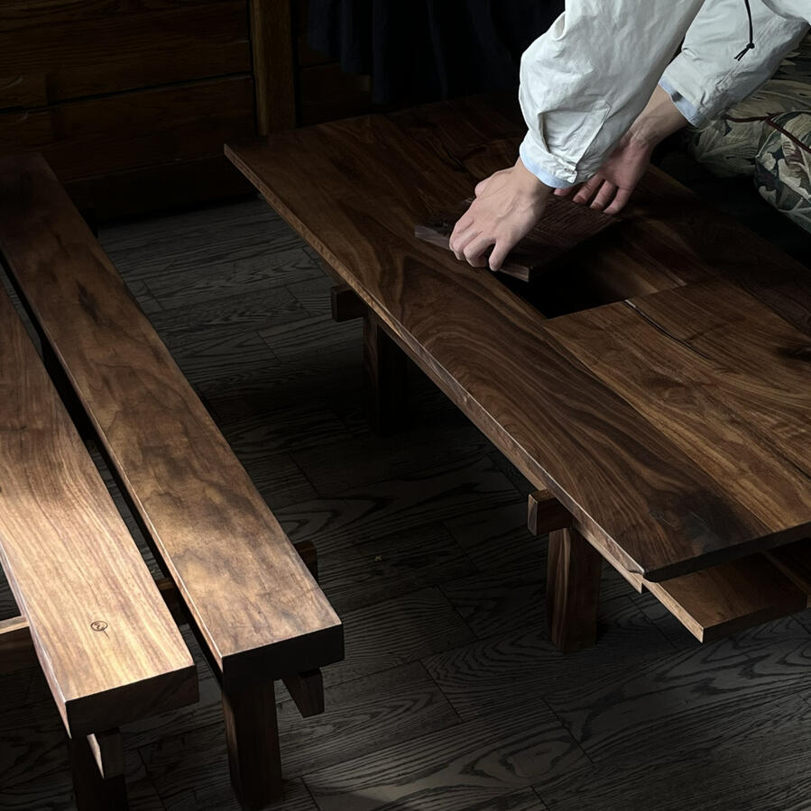 Still image of the Temple's COURTYARD and BENCH being installed at Lost in Tokyo.