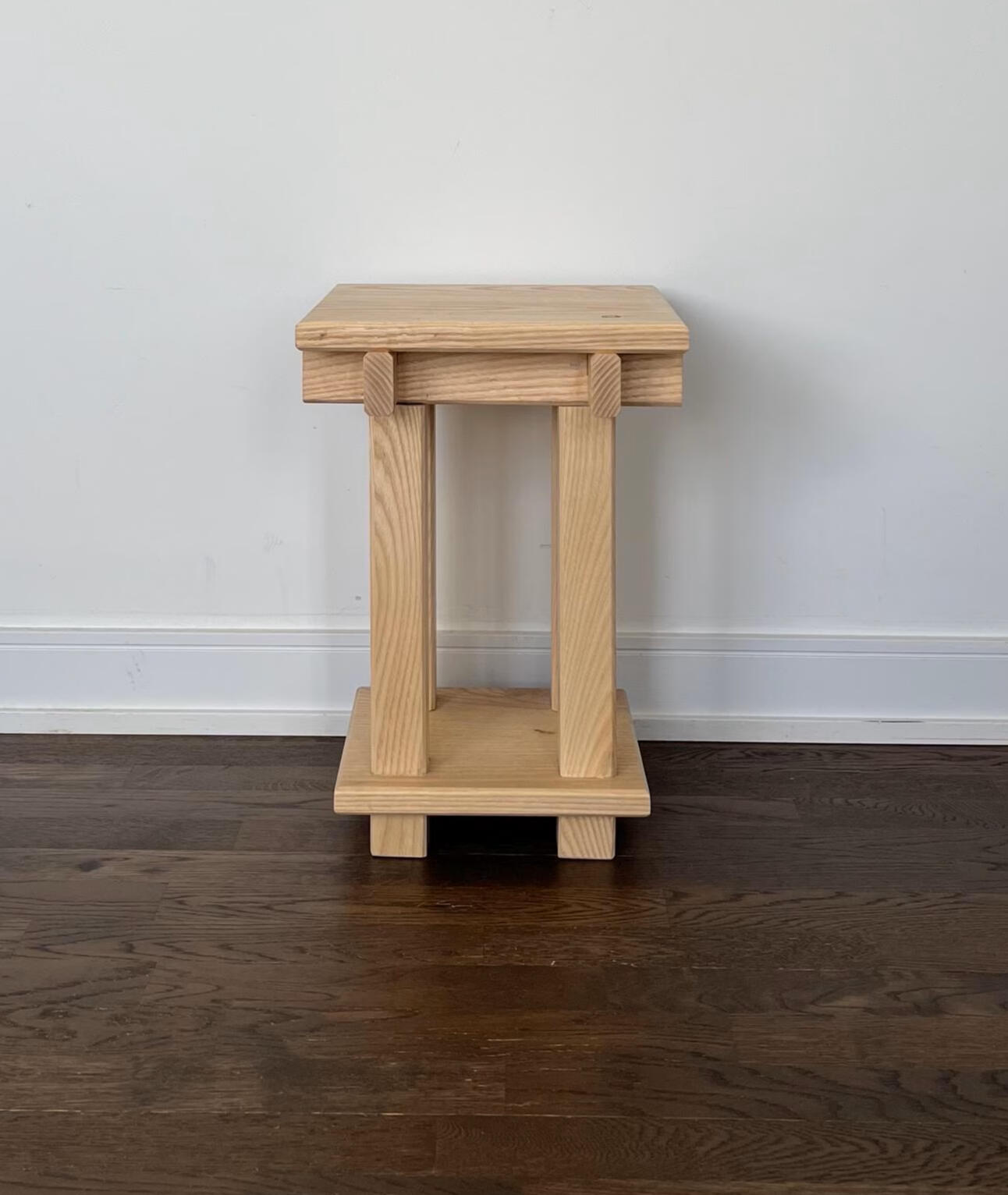 A stool, potstand, side table, made with Ash. An architectural design, with beautiful form and versatile function.